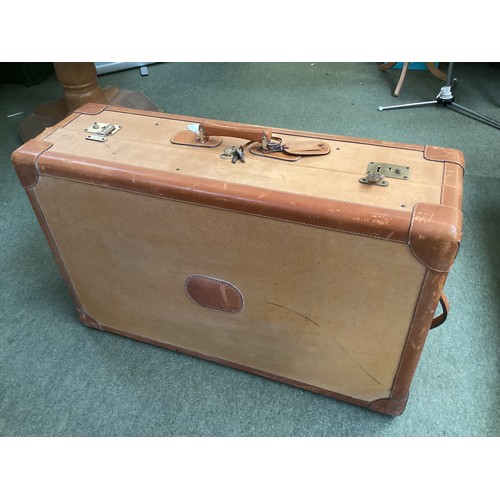 177 - Luggage: A large brown leather and canvas travel cabin trunk with fitted interior and keys, 90cm Wid... 