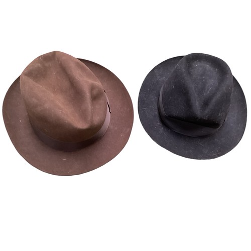 182 - A Lock & Co gents brown Trilby, large (in good condition), and a Herbert Johnson small black Trilby ... 