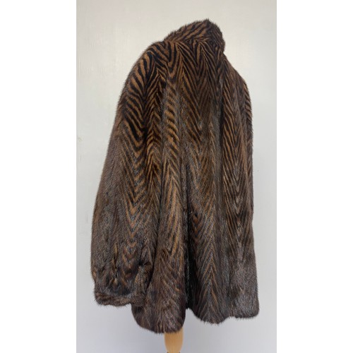 294 - Grosvenor Canada Exclusive to Harrods fur coat with balloon sleeves, brown fur with printed pattern