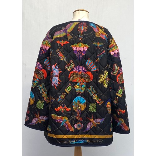 297 - A vintage Hermes, Paris, silk quilted jacket, limited edition, with brightly coloured design.