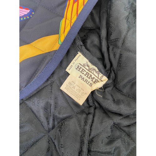 297 - A vintage Hermes, Paris, silk quilted jacket, limited edition, with brightly coloured design.