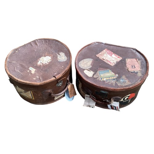 195 - Two travelling hat trunks with numerous applied travel stickers, Orient Line etc,