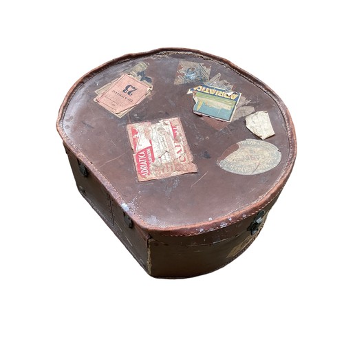 195 - Two travelling hat trunks with numerous applied travel stickers, Orient Line etc,