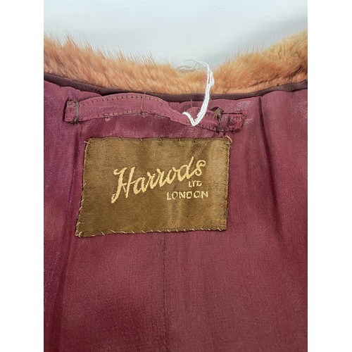 303 - HARRODS, London, ladies vintage brown fur coat, three quarter length. some wear to cuffs and pockets... 