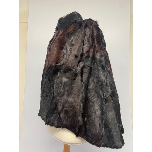 304 - Ladies vintage brown and black fur/ cow hide effect, cape, slight wear to collar