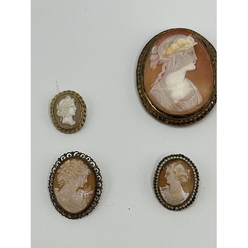 24 - A collection of shell cameo brooches in unmarked yellow metal mounts. Largest. 60mm x 47mm.