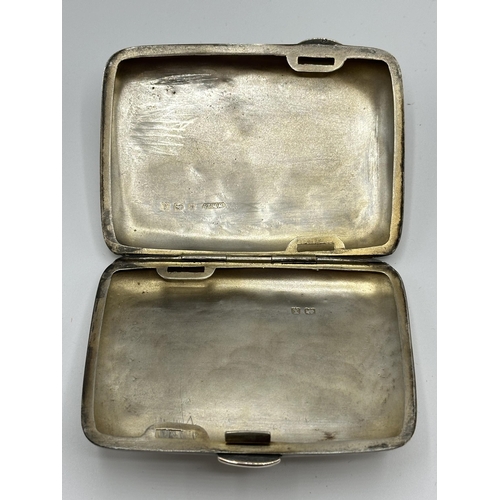 28 - A sterling silver hip shaped cigarette case together with a white metal sovereign holder and vesta i... 