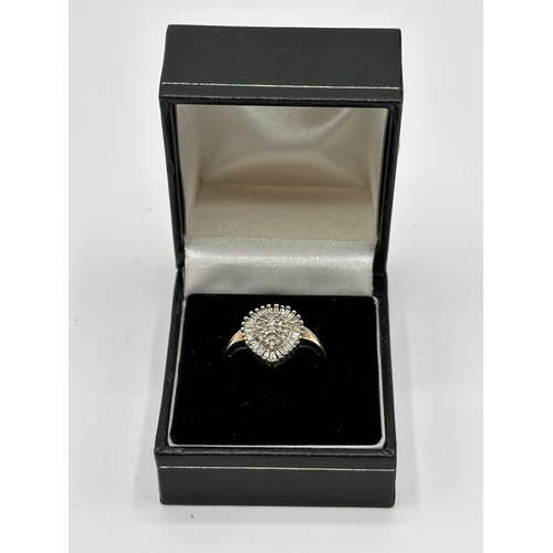 4 - A 10ct gold diamond cluster ring. Pear shaped cluster set with single cut diamonds and a surround of... 