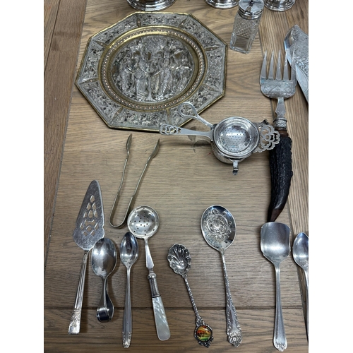 68 - A collection of silver plated wares to include an Art Deco style three pieces tea service  and other... 