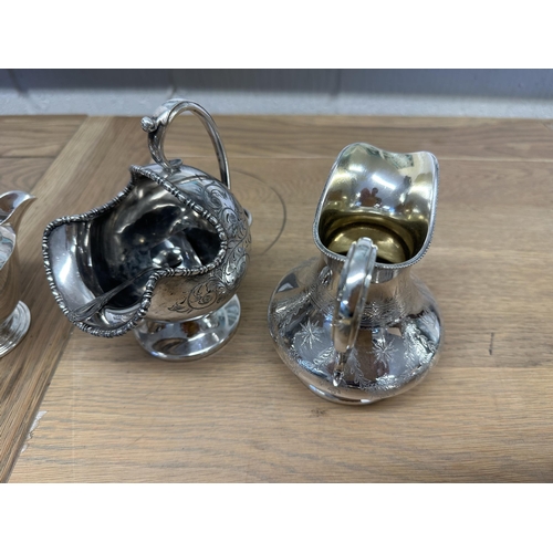 68 - A collection of silver plated wares to include an Art Deco style three pieces tea service  and other... 