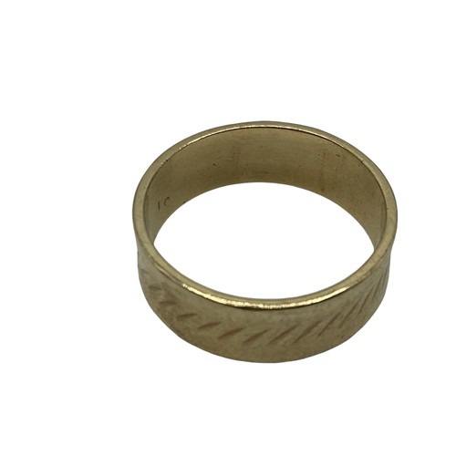 129 - A 9ct gold wedding band. 5.6g. Size U.