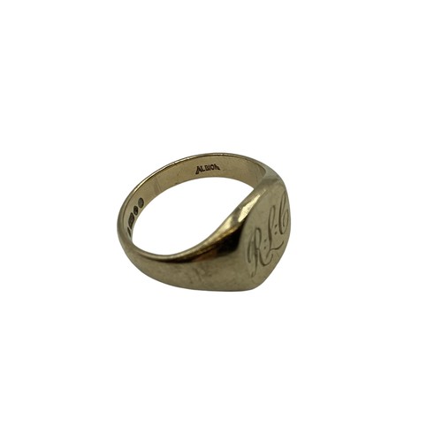 128 - A 9ct gold gents signet ring. 7.1g. Size R.