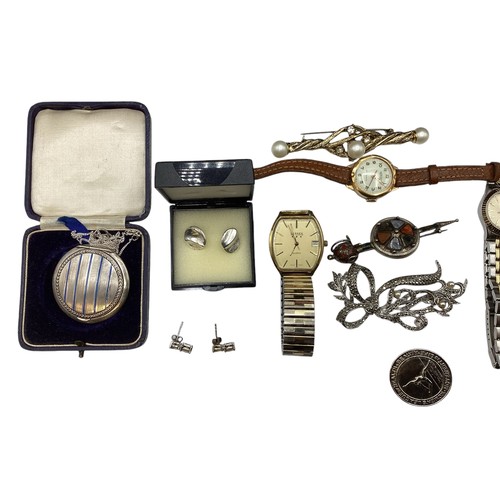 133 - A collection of sterling silver white metal, and costume jewellery and fashion watches , contained w... 