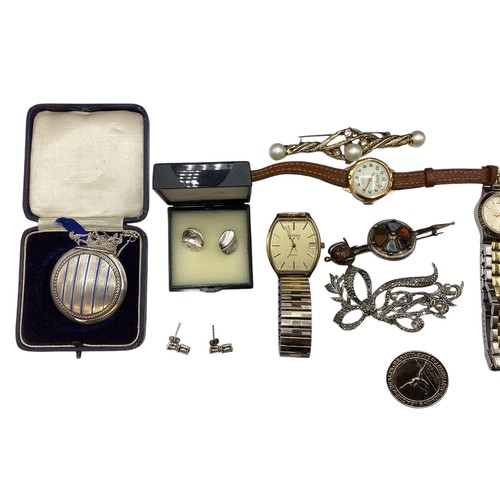 133 - A collection of sterling silver white metal, and costume jewellery and fashion watches , contained w... 