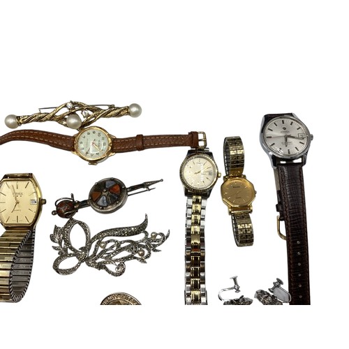 133 - A collection of sterling silver white metal, and costume jewellery and fashion watches , contained w... 