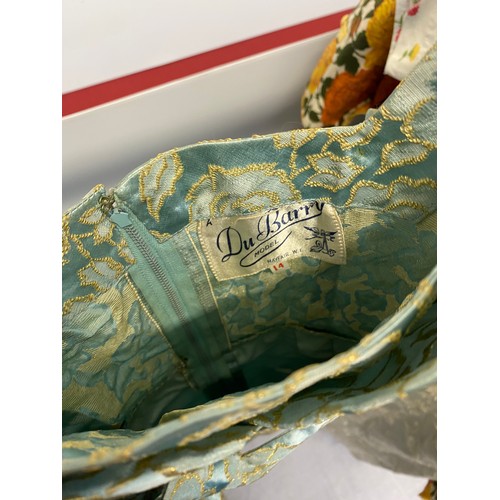 221 - A quantity of Vintage clothing to include a DYNASTY Hong Kong turquoise padded dressing gown/house c... 