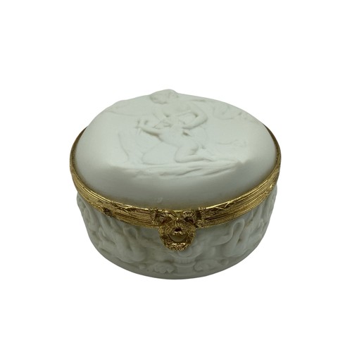 140 - A Limoges, porcelain and gilt metal circular box with raised classical scene 8cm(d)