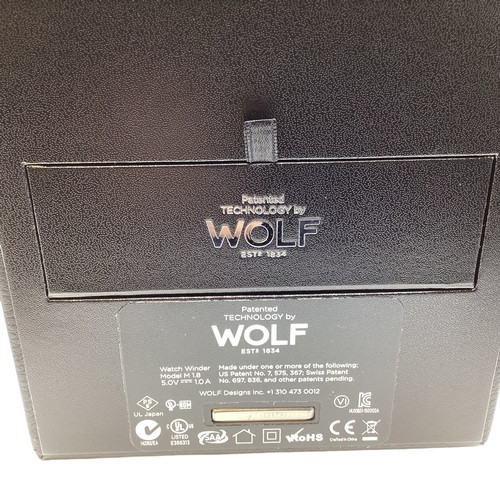 125 - A Wolf watch winder. Unused in original box with  cards and paperwork. Module 1.8.