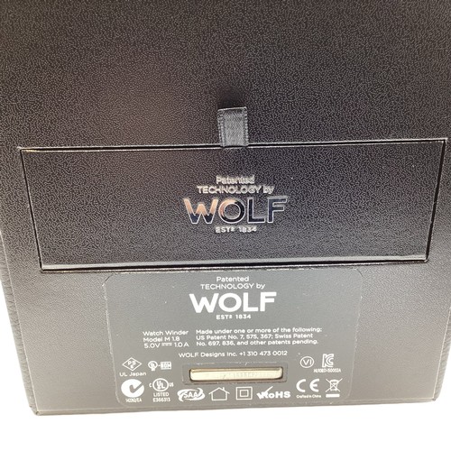 125 - A Wolf watch winder. Unused in original box with  cards and paperwork. Module 1.8.