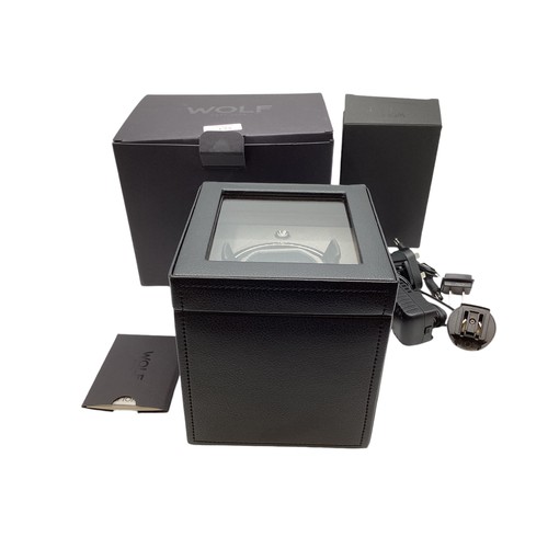 125 - A Wolf watch winder. Unused in original box with  cards and paperwork. Module 1.8.