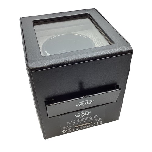 125 - A Wolf watch winder. Unused in original box with  cards and paperwork. Module 1.8.