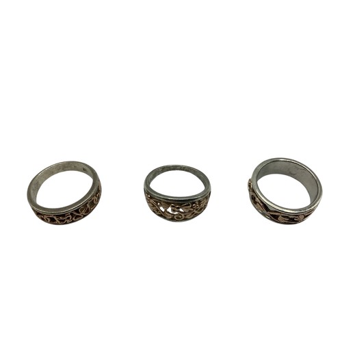 118 - Three Clogau silver and yellow metal rings. Size P, N, O. 13.9g.