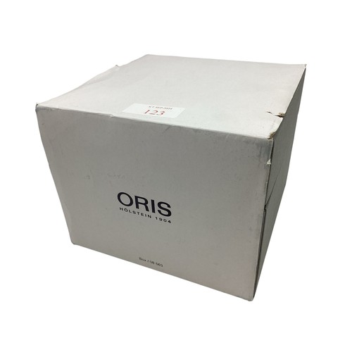 123 - Oris. A Gentleman's Wristwatch. Bronzed and black enamel bezel. Green 30mm face. Original box, outer... 