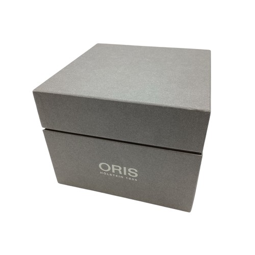 123 - Oris. A Gentleman's Wristwatch. Bronzed and black enamel bezel. Green 30mm face. Original box, outer... 