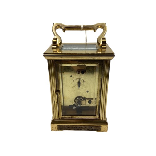 141 - A Mappin and Webb gilt brass carriage clock.