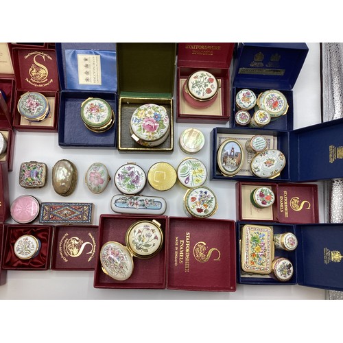 139 - A large collection of Limoges, past times ,Staffordshire enamels and engine turned white metal boxes... 