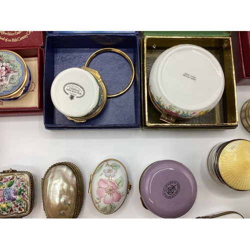 139 - A large collection of Limoges, past times ,Staffordshire enamels and engine turned white metal boxes... 