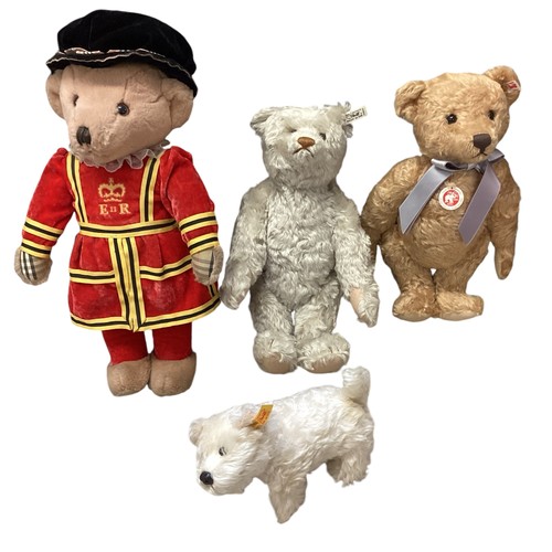 343 - A collection of Teddy Bears. To include three Steiff  and one Burberry example.