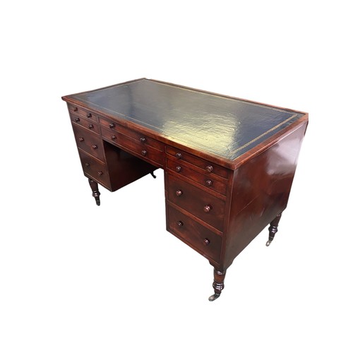 593 - Recently restored William IV kneehole writing desk of 10 drawers with knob handles beneath a blue to... 