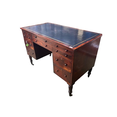 593 - Recently restored William IV kneehole writing desk of 10 drawers with knob handles beneath a blue to... 