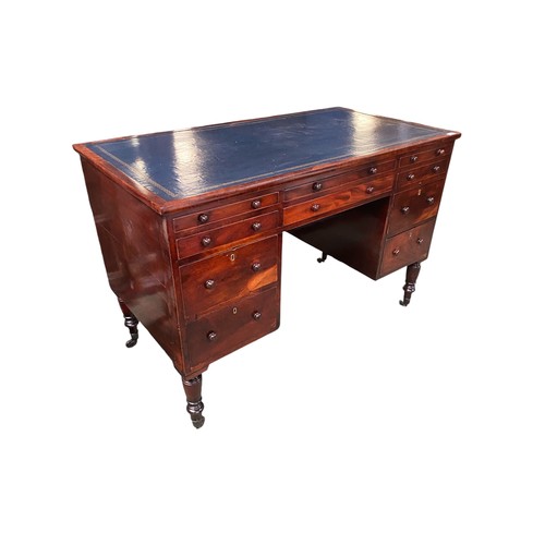 593 - Recently restored William IV kneehole writing desk of 10 drawers with knob handles beneath a blue to... 