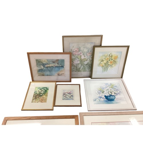 475 - A collection of floral watercolours and prints.