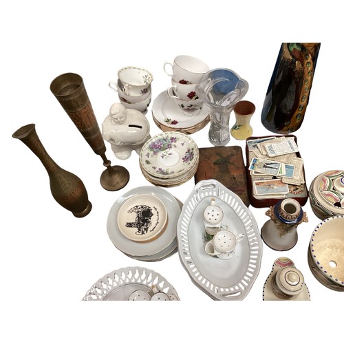 340 - A quantity of collectables to include general china, cigarette cards, books, walking sticks and a to... 