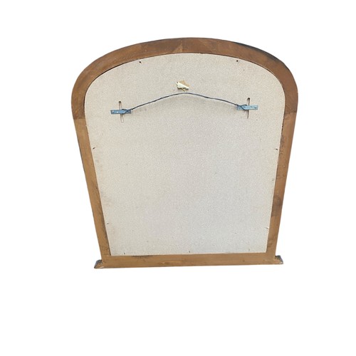 671 - A painted arched top over mantle mirror, 108 cm H