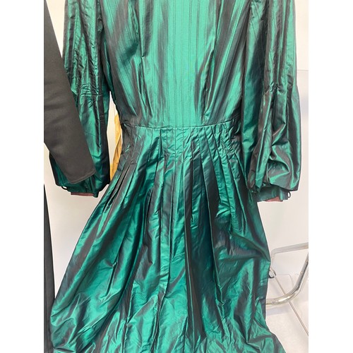 235 - A 1970s emerald/black changeable taffeta dress by LIBERTY of London. High necked bodice, bishop slee... 