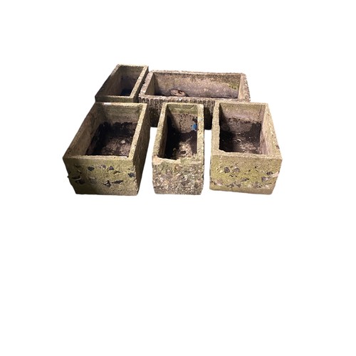 536 - A set of reconstituted garden planters