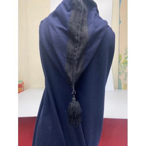 229 - A good Berber navy wool long cloak/ceremonial cape with black braid and hood with tassle, purchased ... 