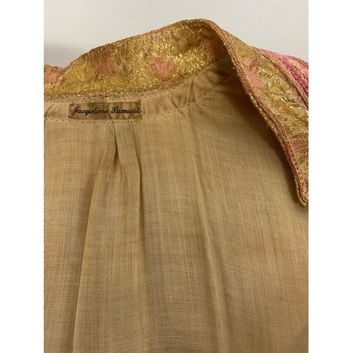 227 - A ornate gold coloured thread and pink trim  Kaftan, purchased in Marrakech in 1964, condition - som... 