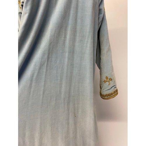 226 - A blue velvet antique wedding Kaftan, embroidered in gold coloured thread, and purchased in Marrakec... 