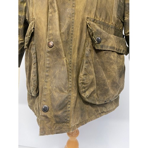 213 - A  traditional BARBOUR Border jacket, approx size 40, in used condition