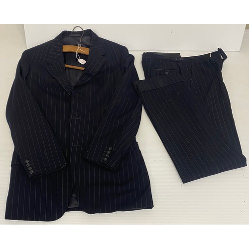 184 - A navy pin striped suit, small, and four pairs of gents leather shoes, in used condition, and as fou... 