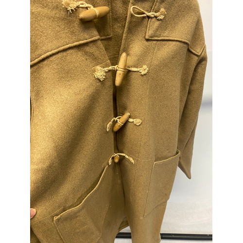 187 - Gents clothing: - a traditional vintage brown duffel coat, large; a green 