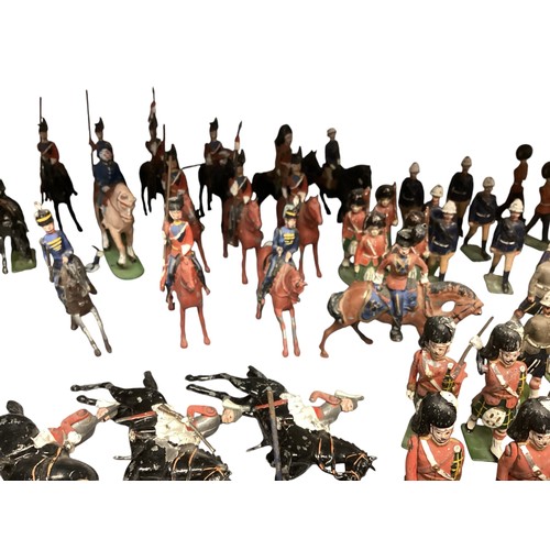 348 - A large collection of Britains and earlier hand painted lead toy soldiers, see all images. Some cond... 