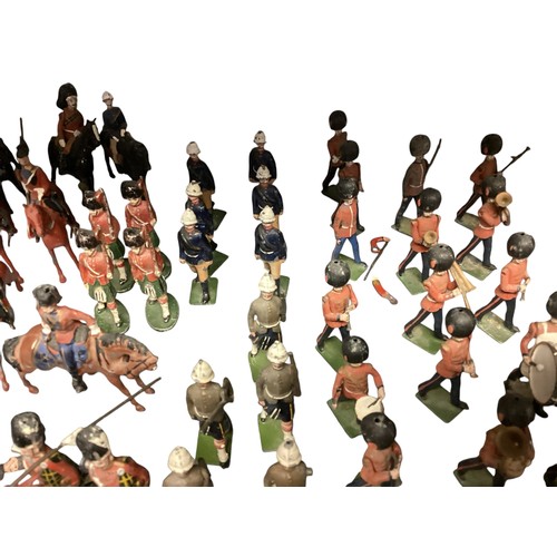 348 - A large collection of Britains and earlier hand painted lead toy soldiers, see all images. Some cond... 