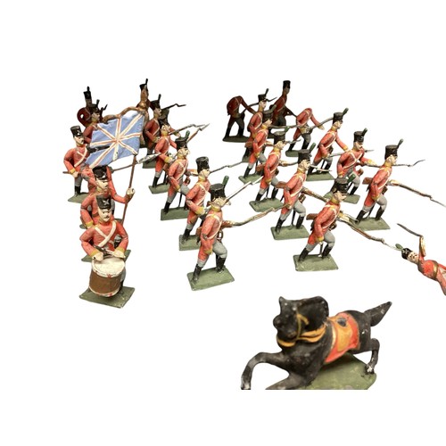 348 - A large collection of Britains and earlier hand painted lead toy soldiers, see all images. Some cond... 