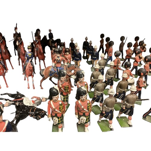 348 - A large collection of Britains and earlier hand painted lead toy soldiers, see all images. Some cond... 